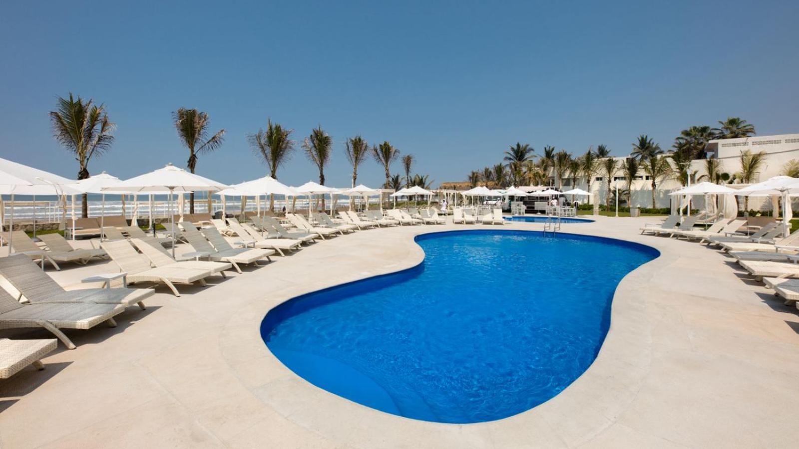 Palacio Mundo Imperial Riviera Diamante Acapulco Exterior photo The swimming pool at the Iberostar Grand Hotel